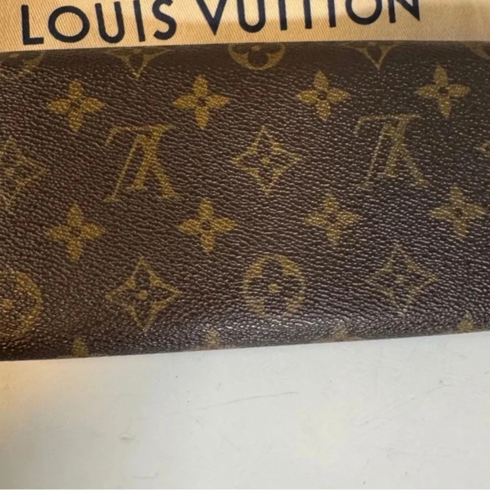 Raffle to win Louis Vuitton Brown Monogram Canvas Envelope Wallet with Gold Snap - Picture 2 of 2